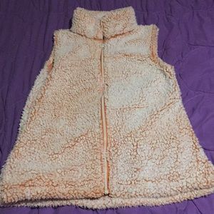 Fuzzy orange and white vest